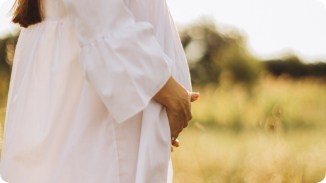 pregnant woman in field